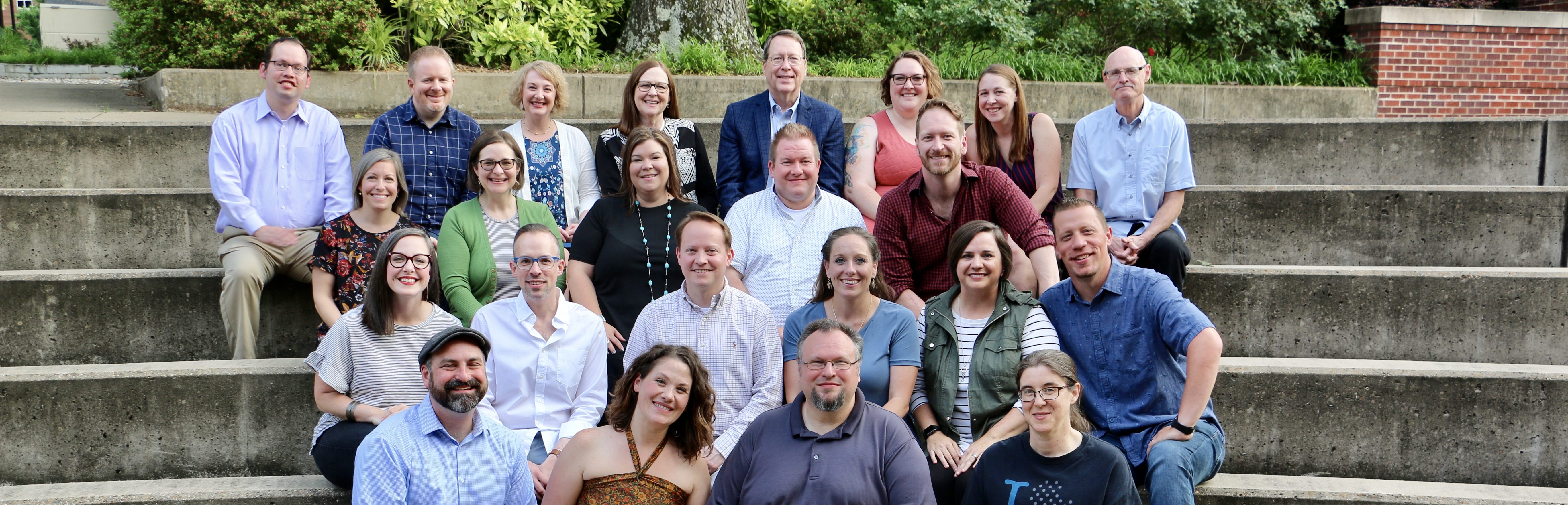 Pictured left to right, front to back – Row 1: Jim Simmons, Caroline Golden Simmons, Mark Simmons, Susanna Biegert Berrones; Row 2: Amy Gaden Taylor, David Stanley, Aaron Hawley, Etta Waller Linton, Kristen Clark Hutchins, Luke Hollingsworth; Row 3: Natalie Putnam Jaggers, Misha Perkins Parker, Anna Lloyd, Jon Merryman, Barrett Baber; Row 4: Dustin Taylor, Tad Hardin, Kristin Maddox Cheng, Cindy Fuller, Charles Fuller, Sarah Fuller Phillips, Becky Fuller, Dave Ozmun.